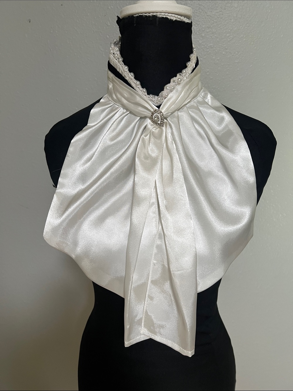 Stock Tie in Ivory Satin with Decorative Brooch and black ribbon